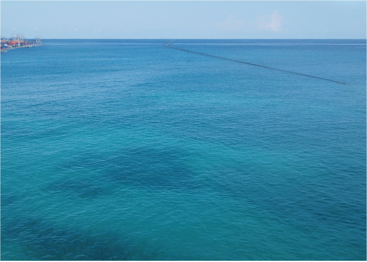 Aerial view container ship going to sea port for import export, shipping or transportation concept background 