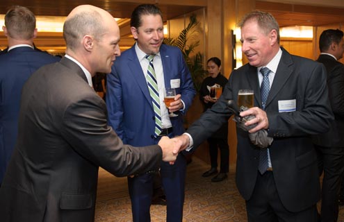 Participants networking at IMA 2015