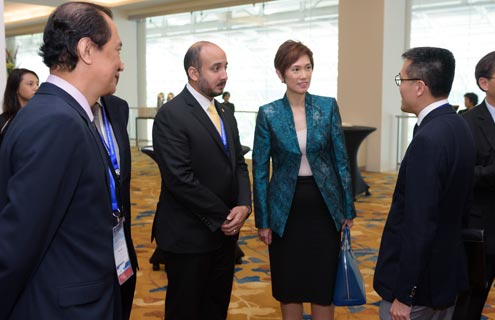 SMS Mrs Josephine Teo and MPA Chief Executive Mr Andrew Tan interacting with delegates