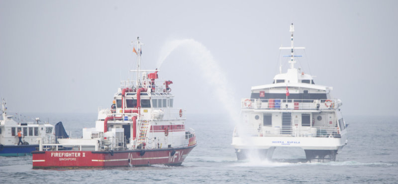 Fire-fighting vessel simulating the putting out a fire