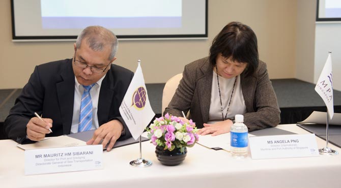 Ms Angela Pngand Mr MauritzSibarani signing the MoU as representatives from the MPA and DGST respectively